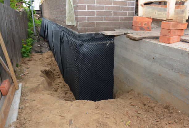 SJ Waterproofing Pros technician performing targeted Foundation Crack Repair assessment in Wyoming, MI